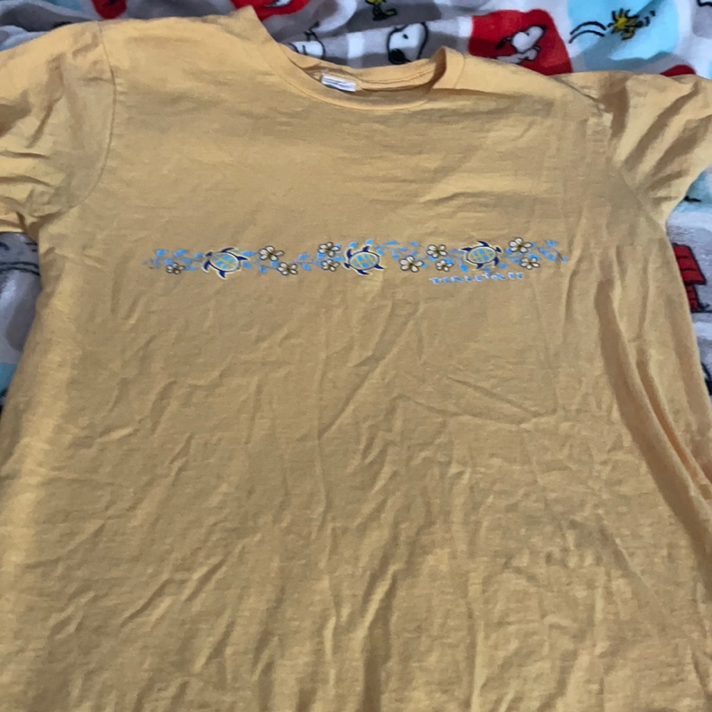 Plain yellow tee, with Hawaiian style turtles